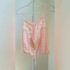 Orange strappy blouse with cinched waist